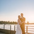 Bride Wearing Beaded Wedding Dress Called Luella By Sottero And Midgley With Groom On A Pier
