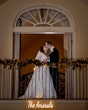 Bride wearing Seneca wedding dress by Sottero and Midgley kissing her husband