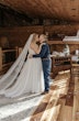 Bride In Chiffon Wedding Dress Called Tasha By Rebecca Ingram With Groom