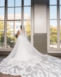 Bride Wearing Chic Crepe Wedding Gown Called Anson By Sottero And Midgley With Veil And Detachable Train