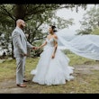 Groom With Bride Wearing Sparkle Tulle Ballgown Yasmin By Maggie Sottero 