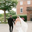 Bride Wearing Modern Wedding Dress Called Marilyn By Sottero And Midgley Walking With Groom