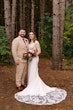 Bride Wearing Crepe Lace Wedding Dress Called Anson By Sottero And Midgley With Groom In The Woods