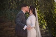 Bride Wearing Simple Keyhole Back Wedding Dress Called Aston By Sottero and Midgley Kissing Groom