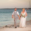 Groom With Bride Wearing Boho-Chic Lace A-Line Wedding Dress Courtney By Rebecca Ingram