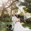 Bride wearing Lettie by Rebecca Ingram walking with her husband and dog