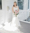 Bride Wearing a Classic Lace Wedding Dress Called Brenda by Rebecca Ingram