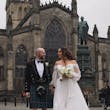 Bride wearing Nerida by Sottero and Midgley walking with her husband