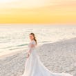 Bride Wearing Boho Sleeved Wedding Dress Called Quintyn By Maggie Sottero