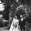 Bride Wearing Modern Wedding Dress Called Marilyn By Sottero And Midgley Walking With Groom In A Garden