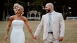 Bride wearing Damiana by Sottero and Midgley holding hands with her husband