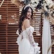 Bride wearing Ryker wedding dress by Sottero and Midgley