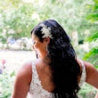Bride wearing wedding dress called Valona with hair down.