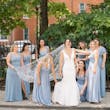 Bride In Simple Crepe V-neck Theodora Rebecca Ingram With Bridesmaids In Blue