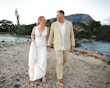 Real Bride in Boho Oversized Floral Lace Wedding Dress with Deep V-Neckline and Pearl Buttons Called Burke by Maggie Sottero