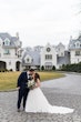 Bride in V neck ballgown called Trinity Lynette by Maggie Sottero with groom