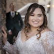 Bride wearing Seneca wedding dress by Sottero and Midgley