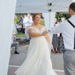 Bride Wearing Chiffon A-Line Wedding Dress Called Heather By Rebecca Ingram Dancing With The Groom