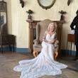 Bride Wearing Beaded Lace Wedding Dress Called Franklynn By Maggie Sottero Sitting In A Chair