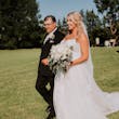 Groom With Bride Wearing A-Line Lace Wedding Dress Marisol By Rebecca Ingram