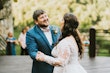 Bride Wearing Shimmery Princess Bridal Gown Called Tiffany By Maggie Sottero Dancing With Long Sleeves