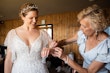 Bride Wearing Beaded Lace A-Line Wedding Dress With Flutter Sleeves Paige By Maggie Sottero