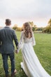 real bride in vintage style lace wedding dress with bishop sleeves called Finley by Sottero & Midgley