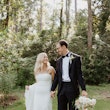 Bride wearing strapless minimalist strapless sheath wedding dress