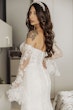 Bride wearing Ryker wedding dress by Sottero and Midgley