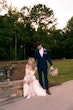 Bride wearing Kensington by Sottero and Midgley sitting with her husband