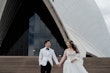 Bride Wearing Princess Ballgown Wedding Dress Called Kimora By Sottero And Midgley Holding Hands With Groom