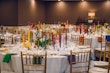 decorated tables with colorful candles