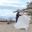 Bride In Chiffon Wedding Dress Called Tasha By Rebecca Ingram With Groom