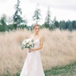 Bride wearing a budget friendly ballgown wedding dress