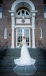 Bride wearing Lorraine Dawn wedding dress by Rebecca Ingram