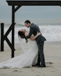 Bride wearing Frederique wedding gown by Maggie Sottero dancing with groom