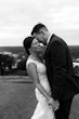 Bride Wearing Lace Backless Wedding Dress Called Chauncey By Sottero And Midgley Smiling With Groom