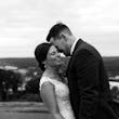 Bride Wearing Lace Backless Wedding Dress Called Chauncey By Sottero And Midgley Smiling With Groom