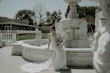 Real Bride in Illusion V-Back Sheath Wedding Gown with Lace Motifs and Side Illusion Panels Called Angie by Rebecca Ingram