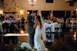 Groom Dancing with Bride in Vintage-Inspired Fitted Wedding Dress with Beaded Lace Motifs called Veronique by Maggie Sottero