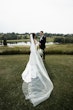 Bride wearing Tuscany Royale by Maggie Sottero with her husband