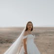 Bride Wearing Simple Ball Gown Wedding Dress With An Elegant Overskirt Called Kyrie By Maggie Sottero