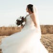 Bride In Tulle A-Line Wedding Dress Called Lorraine Lane Marie By Rebecca Ingram
