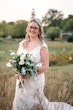 Bride Wearing Sultry Lace Cap Sleeve Wedding Dress Chauncey By Sottero And Midgley