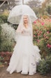 Photo of Bride In Ruffled Wedding Dress Called Timbrey By Maggie Sottero