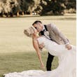 Bride wearing Tuscany Royale by Maggie Sottero kissing her husband