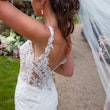 Bride wearing crepe sheath wedding dress