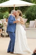 bride in boho lace  wedding dress called roxanne by sottero and midgley