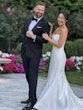 Bride wearing Barcelona by Sottero and Midgley laughing with her husband