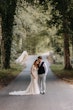 Groom With Bride Wearing Sequin Mermaid Wedding Dress Elsie By Rebecca Ingram